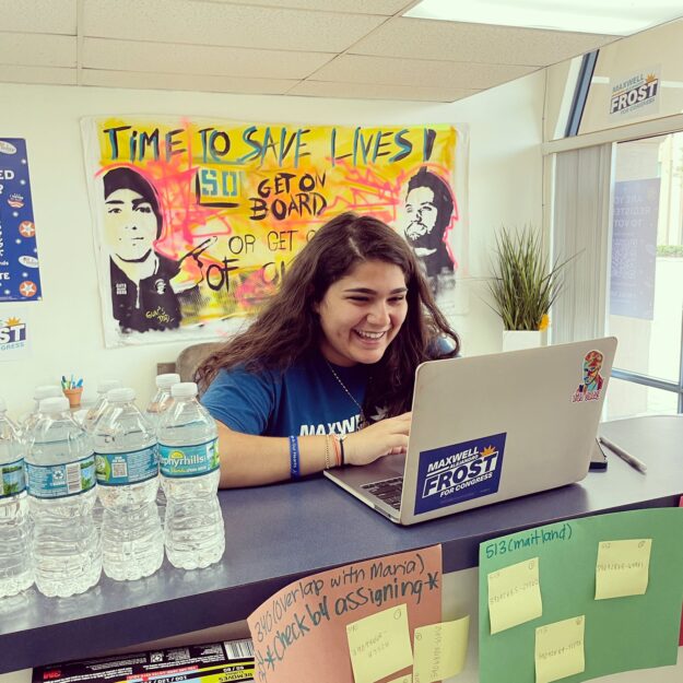 Ray Anid works on her laptop in the Team Frost office.